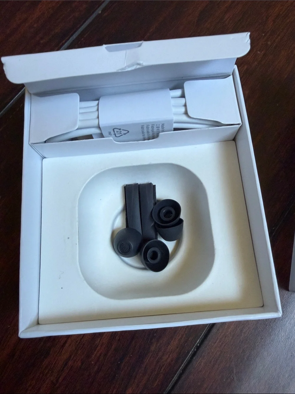 Samsung Galaxy Buds FE Earbuds in Black and White Charging Case
